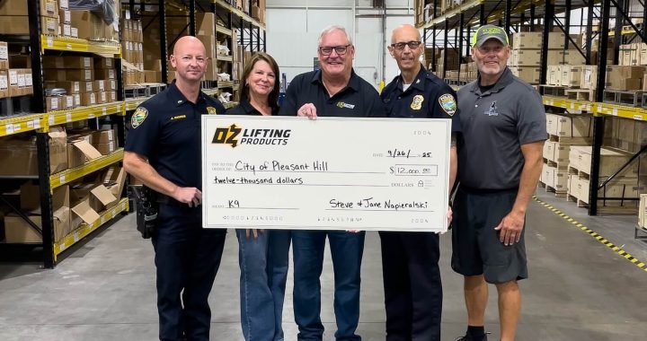 Steve and Jane Napieralski, of OZ Lifting Products, present Chief Pizzano and Lt. Grimes from the Pleasant Hill Police Department with a $12,000 donation for the acquisition and training of a specially imported K9. Trace Erickson, of Code Blue K9, is far right. This dog will be trained in the 2026 course.